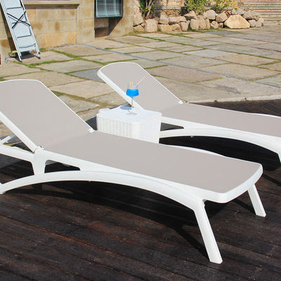 Giardino esterno Teslin in plastica Chaise impilabile Poltrone a sdraio per hotel Patio spiaggia