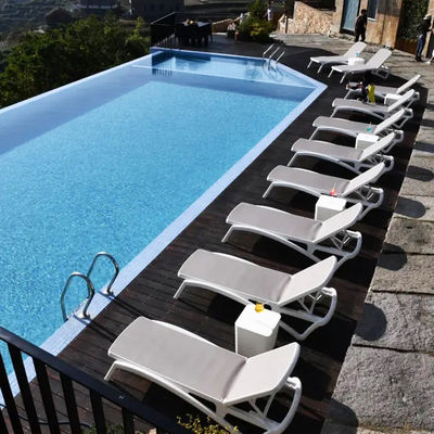 Giardino esterno Teslin in plastica Chaise impilabile Poltrone a sdraio per hotel Patio spiaggia