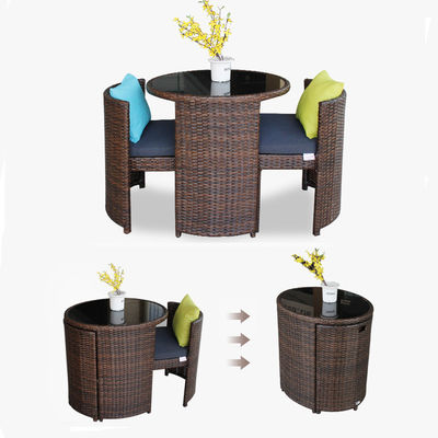 Tavolo da pranzo e sedia rotondo in vetro temperato di rattan per caffè