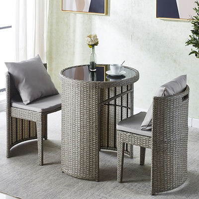 Tavolo da pranzo e sedia rotondo in vetro temperato di rattan per caffè